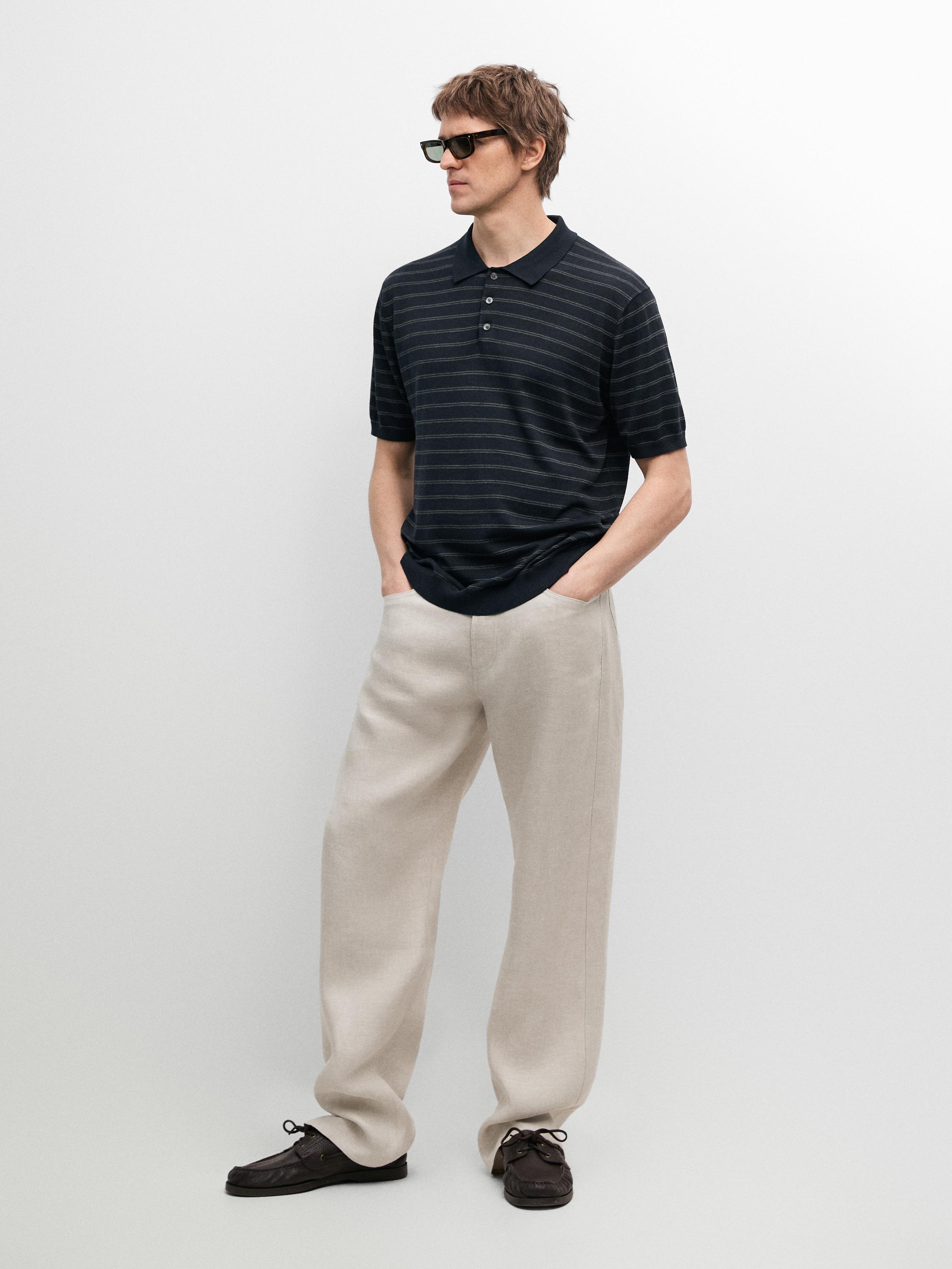 Cotton blend knit polo shirt with striped detail